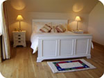 A bedroom with a lovely view North-East towards Belfast Mountain.